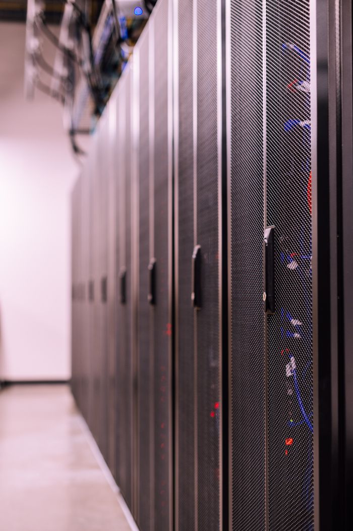The Art of Drawing Readers In: Your attractive post title goes here Row of similar lockers with various optic fiber cables in modern data server room